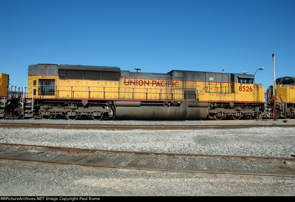 EMLX 8526, EMD SD90MAC-H, in storage on the KCS